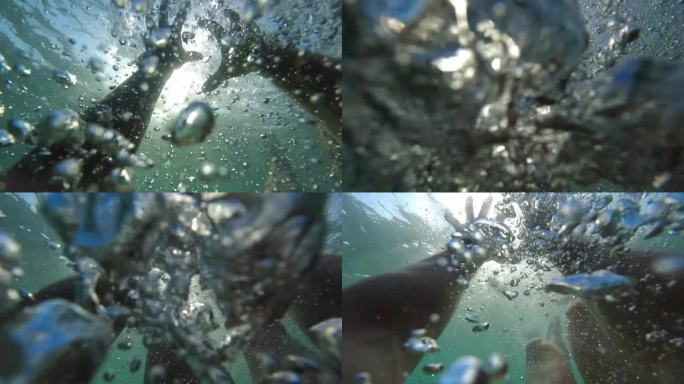 溺水者视角：慢动作下仰望太阳并伸手触碰水面。