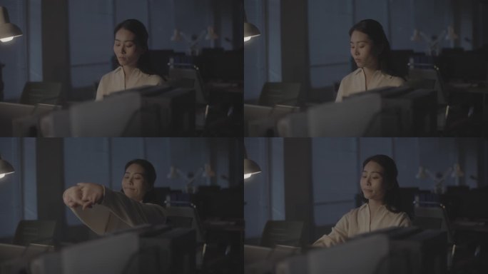 职场女性打哈欠伸懒腰夜晚加班 疲惫