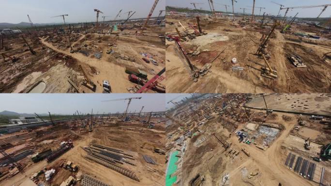 南京北站穿越机繁忙的建筑工地全景航拍