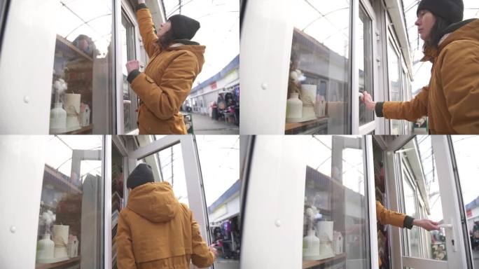 一位女店长把橱窗上的“关门”改为“开门”