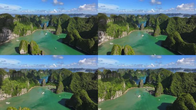 在越南北部下龙湾的海上，航拍无人机拍摄的观光船与岩石山的淡蓝色天空