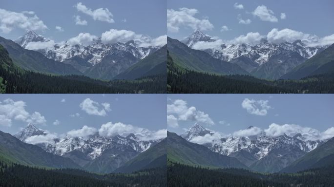 雪山云雾缭绕的壮丽景色