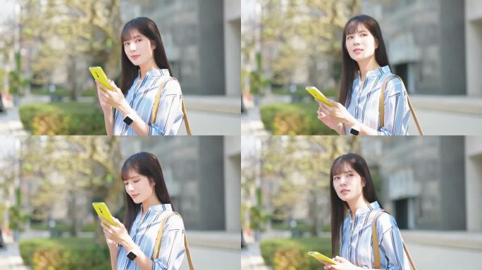 女商人查看手机信息