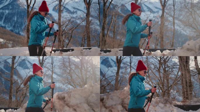 一位老妇人走过雪地。老年女性冬季登山。主动退休年龄