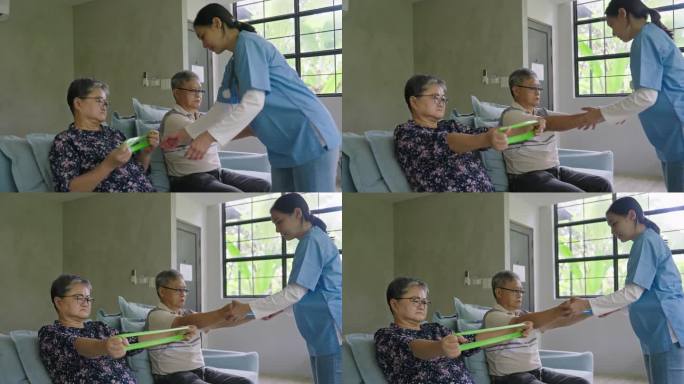 物理治疗师帮助老年人在家里举起运动橡皮