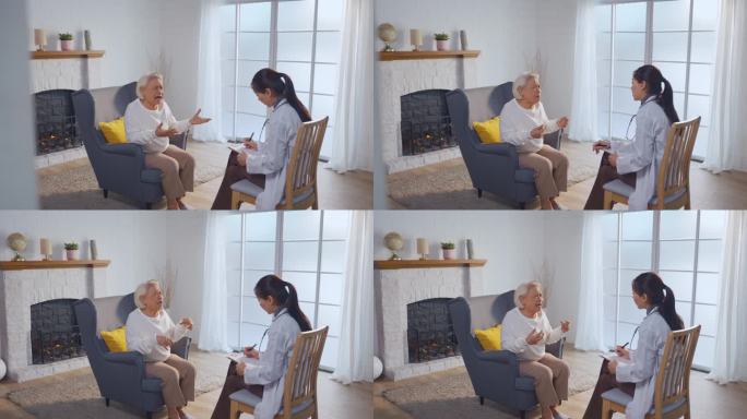 亚洲护理护士检查和倾听老年压力妇女患者。有吸引力的专业护理妇女的支持，给予建议和咨询老年人，成熟的祖