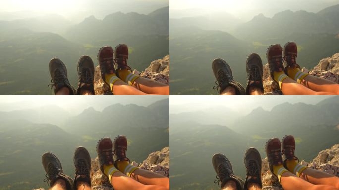 女人的土地的特写，男人的腿在阿尔卑斯山的登山鞋