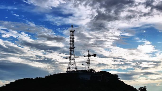 山顶造物 云霞溢彩  信号塔与云层景观
