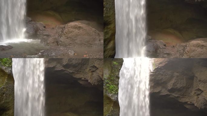 一个戏剧性的垂直平移镜头展示了戈亚拉贾瀑布的全貌，从岩石底部到茂密的树冠丛林。