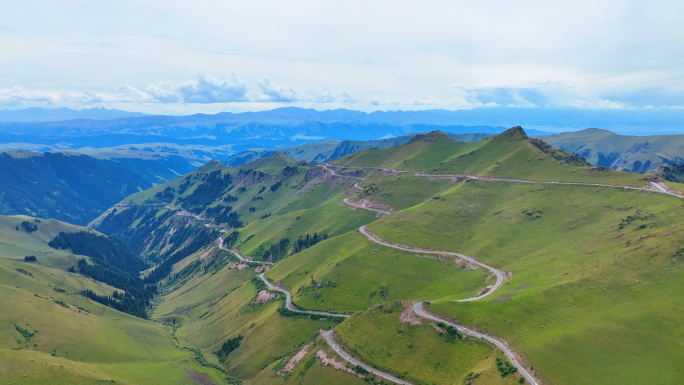 绿色山峦盘山公路 蜿蜒山路航拍