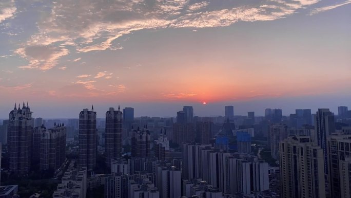 城市建筑群晚霞延时拍摄