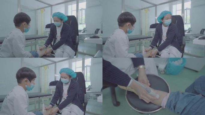 医疗人员进行腿部超声诊断