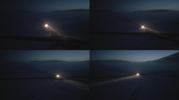 汽车在乡村冬季道路上行驶并在夜间转弯的跟踪镜头
