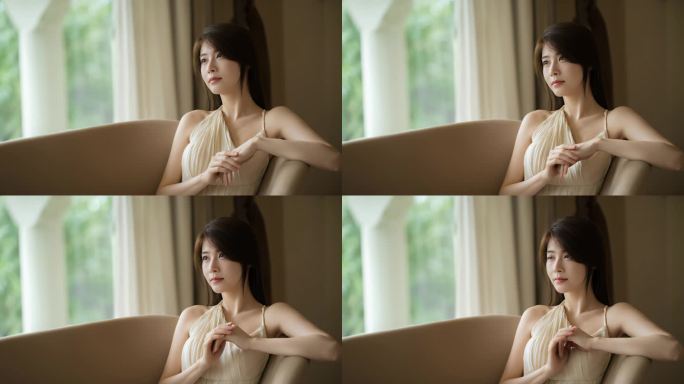 窗边美人侧颜凝视