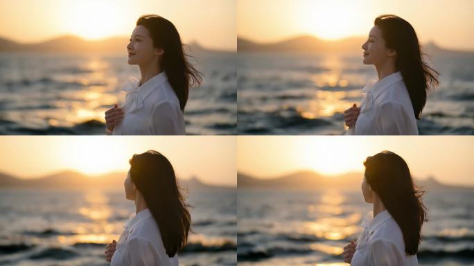 海边夕阳下的宁静少女