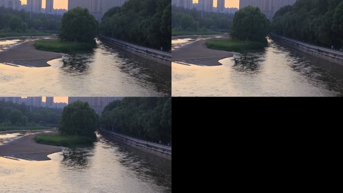 傍晚城市河畔风光