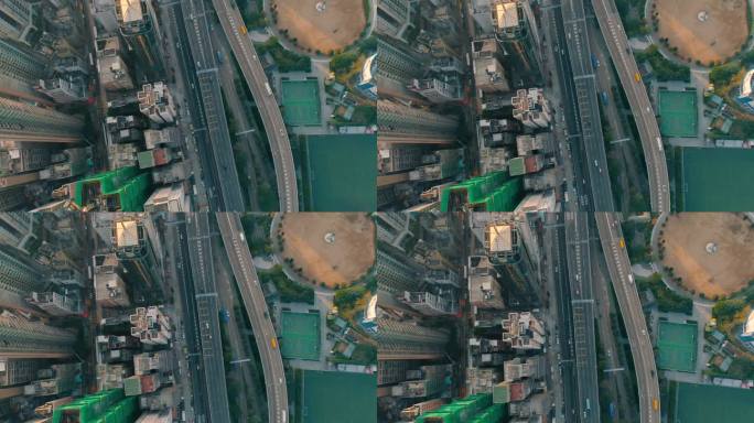 中国香港 - 2025年2月2日：航拍视角展示繁忙城市环境中的城市景观、道路和绿地。