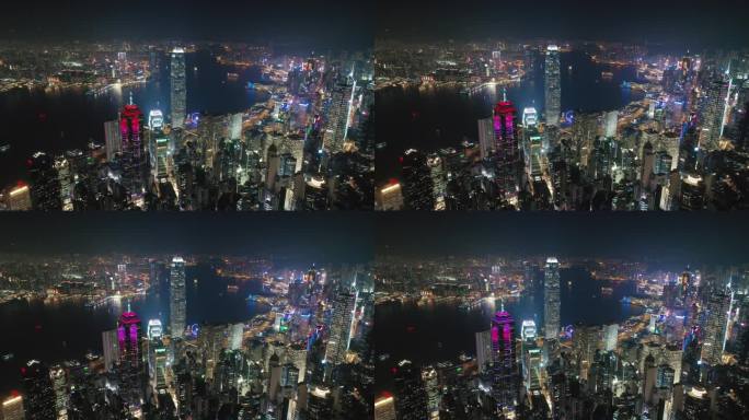 中国香港 - 2025年2月2日：生机勃勃的夜景天际线在港口上展示出耀眼的灯光，城市景观在水面上倒映
