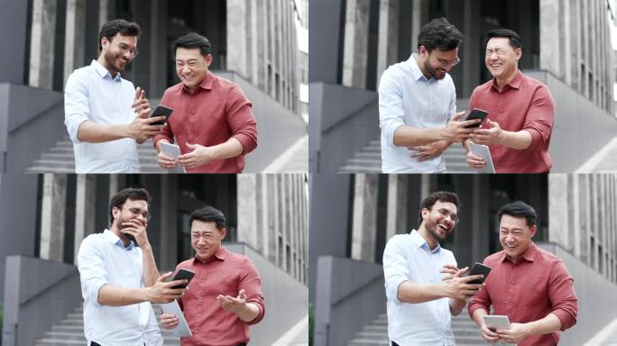 两位商人在办公楼外看手机，享受幽默时刻。