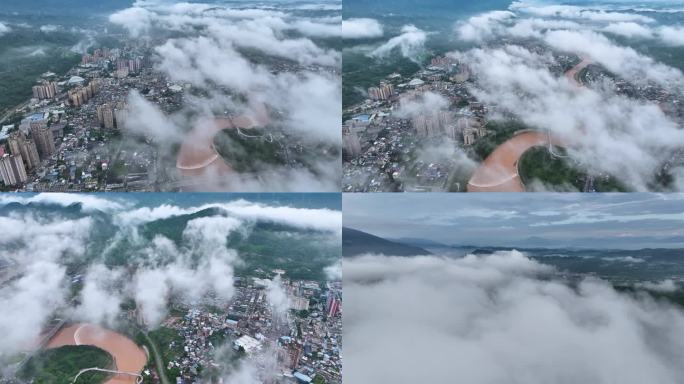 航拍雨后城市风光云雾缭绕的城市景观