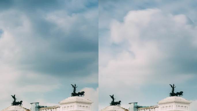 罗马，意大利。人们在夏日的Via Dei Fori Imperiali上走动，靠近圣卢卡与圣马丁教堂