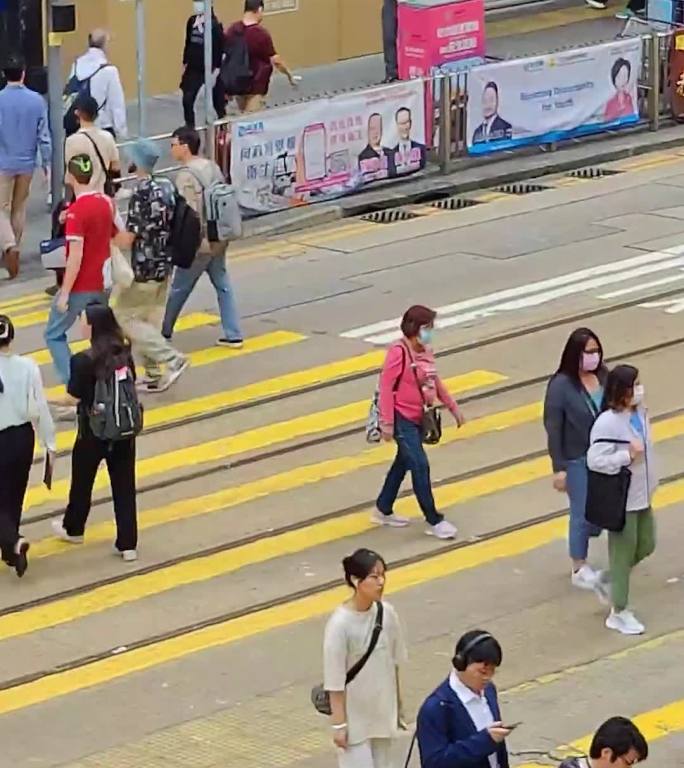 香港繁华地段过红绿灯人来人往日景视频8K