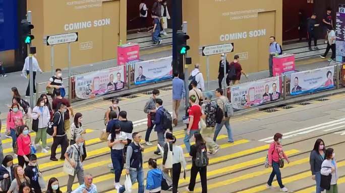 香港繁华地段过红绿灯人来人往日景视频8K