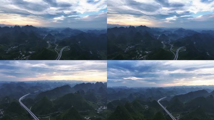 云雾缭绕的壮丽山河  山峰里的高速公路