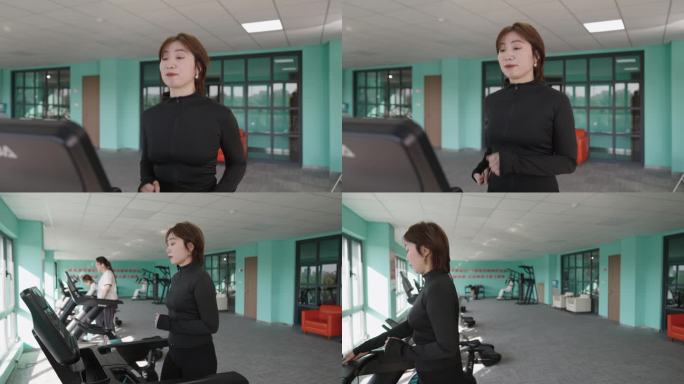 4K女子在跑步机跑步健身