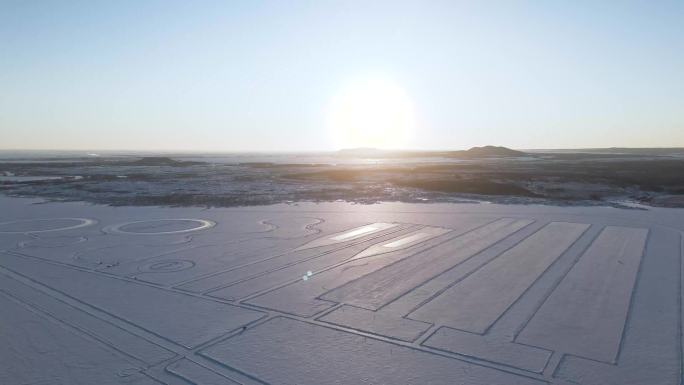 4K牙克石汽车测试场地雪地画圈航拍创意