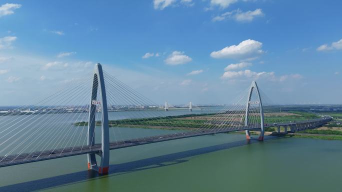 4K滨海新城曹娥江越东大桥延时航拍4