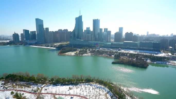 航拍安徽合肥冬天雪后雪景政务区天鹅湖