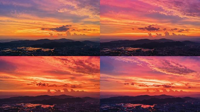 航拍城市夜幕的壮美云霞夕阳火烧云背景素材