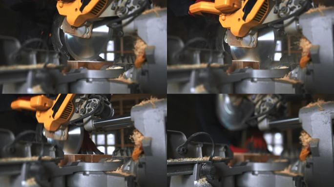 在建筑工地上锯木头