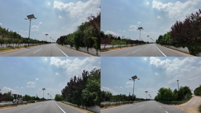 阳光下的公路与太阳能路灯