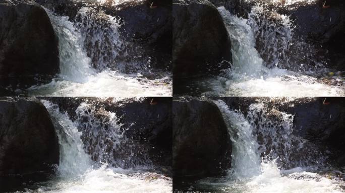 岩石间流淌的清澈溪流