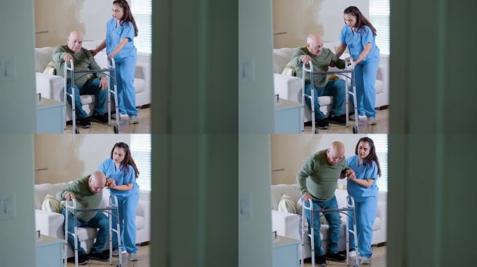 西班牙裔家庭护理人员帮助老年男性使用助行器。