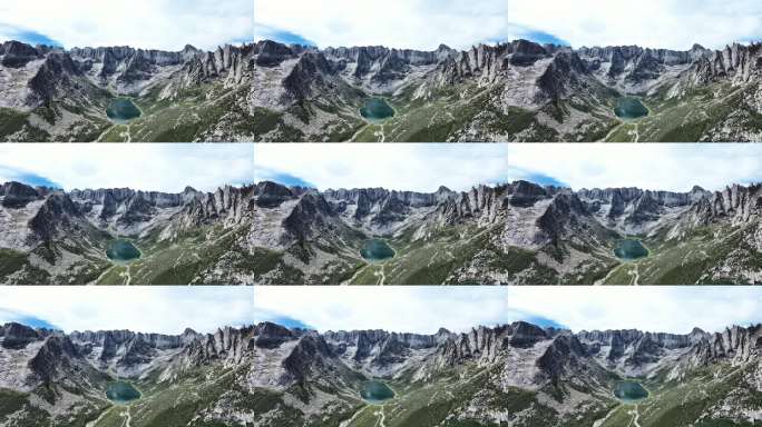 航拍蓝天白云下莲宝叶则山谷中的扎尕尔错湖