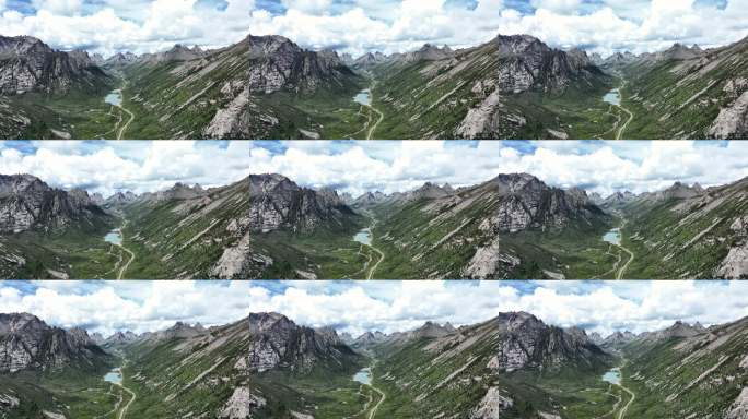 航拍蓝天白云下的四川莲宝叶则群山风光