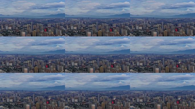 航拍山下城市云彩