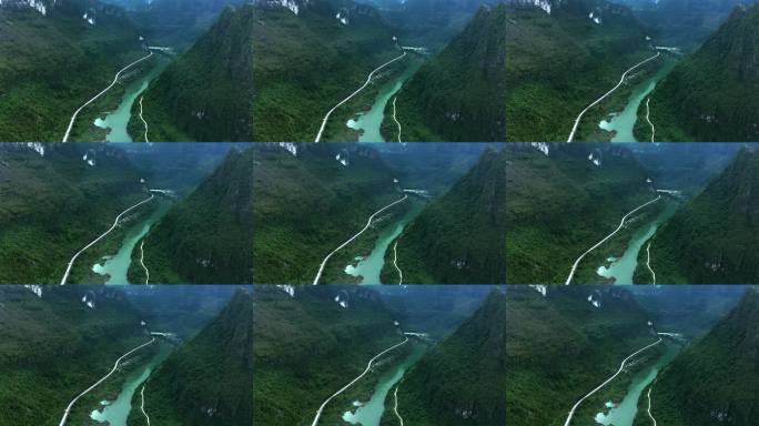 广西三峡高山河流间蜿蜒公路