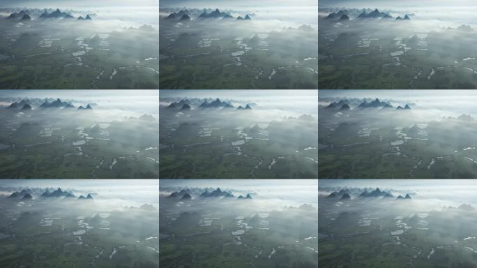 航拍日出云雾缭绕下喀斯特地貌稻田风光