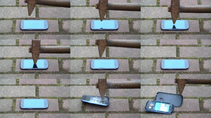 用锤子砸毁手机，象征数字排毒。