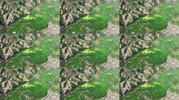 俯瞰阳光下甘南高原地区的丘陵和河流