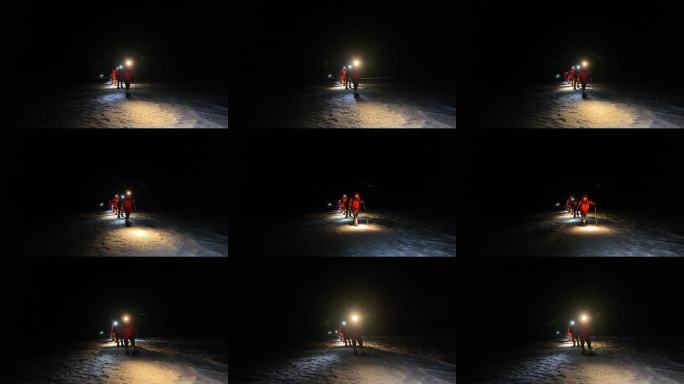 慕士塔格峰雪山登山队员夜间行进冲顶
