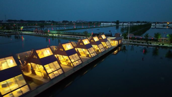 水上亮灯民宿星空酒店夜景航拍
