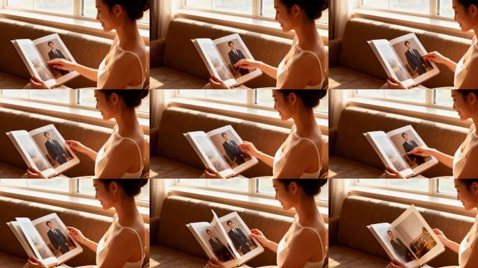 阳光房间看照片的女人