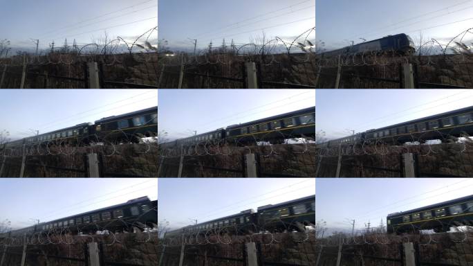 火车行驶过铁丝网围栏