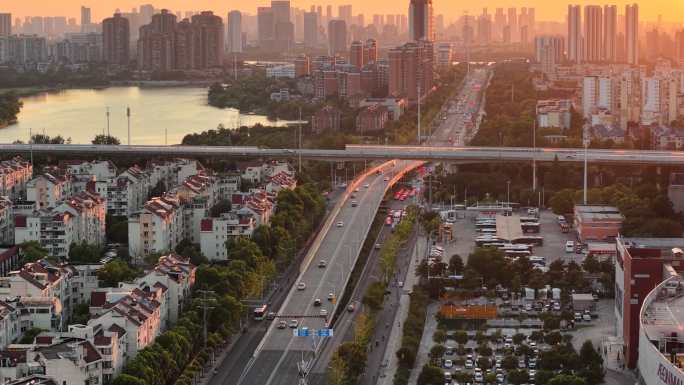 黄昏城市道路车流 城市日落航拍交通