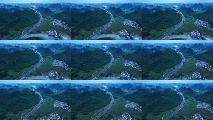 空中俯瞰喀斯特地貌公路，伴有云彩